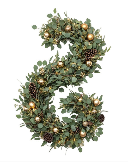 A Glowing Garland with Golden Baubles - Florist London